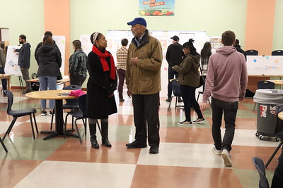 people talking at event