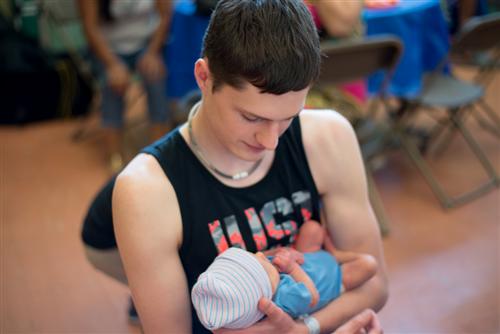 Teen Father and Infant 