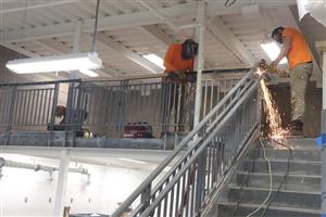 workers finishing railings 