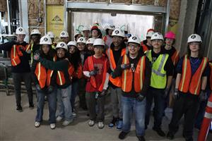Benson students gather for a picture as they tour the site