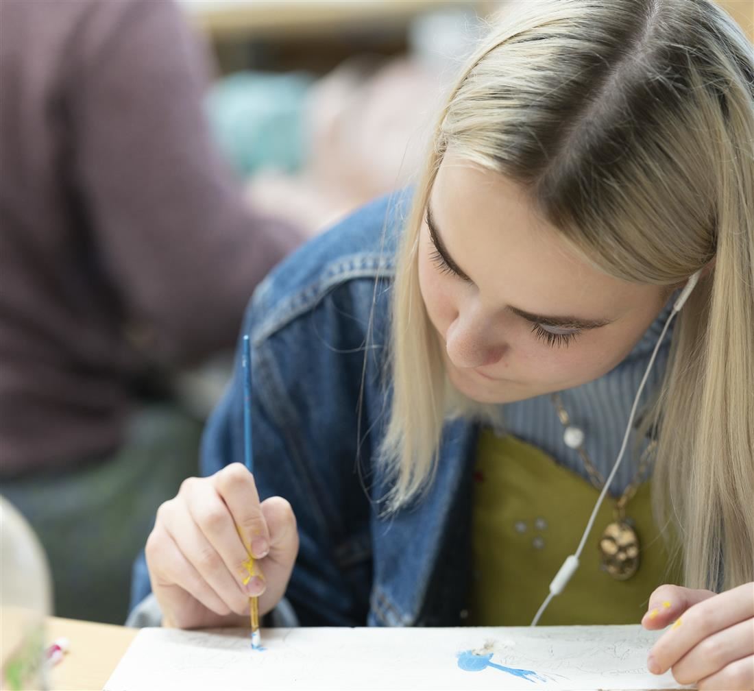 Art student working on art project