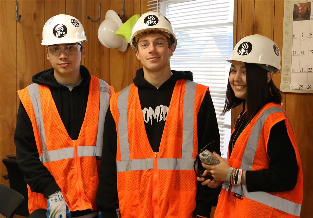 Students in construction uniforms